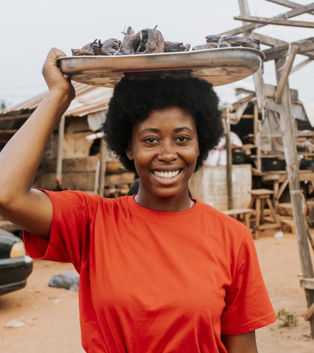 medium-shot-smiley-woman-carrying-food